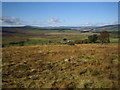 NO7190 : Midtown farm viewed actross moorland from Garrol Hill by Nigel Corby
