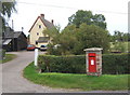 TM0463 : House at Ward Green with postbox beside the lane by Andrew Hill