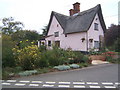 Cottage at lane junction