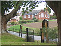 Looking through the church gates to the school in the next square