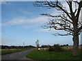 Looking NW on Waxham Road from entrance to Walnut Farm