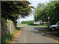 Junction of Hay Lane with the A258 Sandwich Deal road