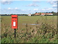 Rural postbox, looking towards Tannington Hall