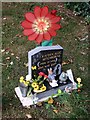 Gravestone and adornments, Newport Cemetery, Lincoln