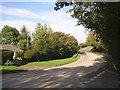 SN3853 : The A487 at Pontffynnonddewi, Llandissiliogogo by Humphrey Bolton