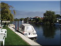 Small cruiser on Thames at Ham Island