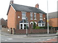 Semi-detached houses at junction of Locks Road with the A27