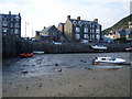 SH6115 Barmouth quay at low tide from a mud bank