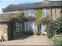 SE1241 : Cottage behind Eldwick Hall by Tony Murgatroyd