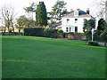 Village green and house on junction of Church Road