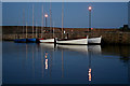 NJ1469 : Lighting up time at Hopeman harbour by Des Colhoun