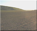 An extensive ploughed field south of Llanengan village