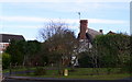 Ancient cottage beside the houses of Norton development