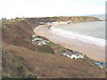 Clap-board beach chalets at Nefyn