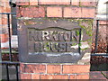 House Sign carved in sandstone