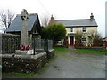 War memorial, lychgate and cottage