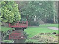 Bournemouth Gardens: red bridge reflected