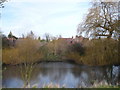 Looking across the pond to Lynsted, with the church in the distance