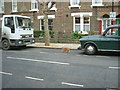 Cat crossing the road - Olliphant Street, W10