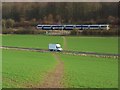 Footpath across farmland, the A4010 and the Chiltern Line, West Wycombe