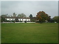 The Two Brewers pub at Chipperfield with part of Chipperfield common in foreground