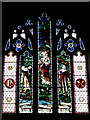 TL9997 : St Peter's church - stained glass window by Evelyn Simak