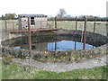 Small reservoir near farm