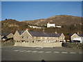 Promenade council estate with Hendre Mynach Hotel behind