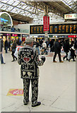 TQ2879 : Pearly King on the Central Concourse, Victoria Station, London SW1 by Kevin Gordon