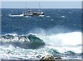 Fishing boat passing Papigoe