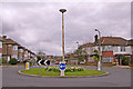 Roundabout at crossroads of Merrivale and Sheringham Avenue, London N14