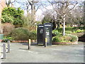 Black telephone boxes.