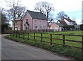 Houses by start of driveway to Tostock Old Hall