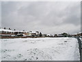 Looking across snowy field from western end of Ranelagh Road