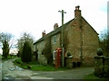 Phone box and cottages at Willey