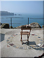 SW3426 : A seat with a view of Land's End by Pauline E