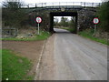 NT0971 : Newhouse Road under the Railway Bridge by Chris Heaton