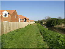 TA1828 : New Housing Complex, footpath and Burstwick Drain by Andy Beecroft