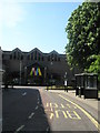 Looking past the Market Parade Bus Stop to the Meridian Centre