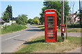 Gasthorpe telephone kiosk and letterbox, looking north along lane towards A1066