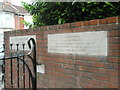 Date stone at entrance to Orchard Park