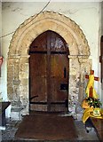 TG1210 : St Peter's Church, Easton, Norfolk - Porch doorway by John Salmon