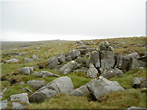 SD8597 : A scatter of stones and a cairn that looks almost natural by Ian Greig