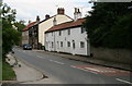 Three White Cottages