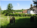 Looking E across the graveyard at St Mary the Virgin church