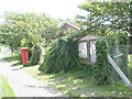 Postbox by the village notice board