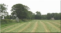 SH4666 : Standing stones and old cottage at Bryn Gwyn by Eric Jones