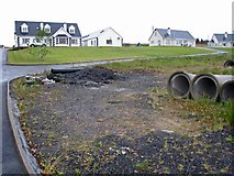 G7977 : New homes and pipeline construction along the N56 road by C Michael Hogan