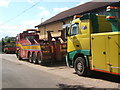 Colourful recovery vehicles outside business premises, Dallinghoo