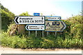 SW4224 : Road signs, Boskenna Cross by Mari Buckley